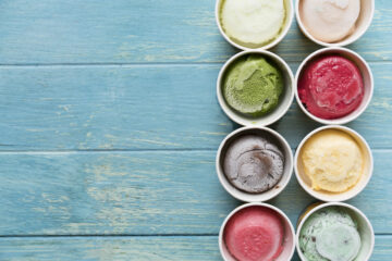 Top,View,Of,Ice,Cream,Flavors,In,Cup,And,Topping,